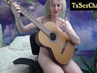 Thin tranny girl likes showing a guitar on cam - ashemaletube.com on ashemalesex.com